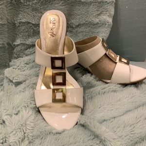 White patent wedge with gold accent,  comfortable cushion sole. Wore once